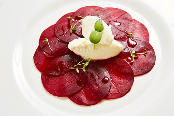 Image showing Beet salad with cheese and walnuts