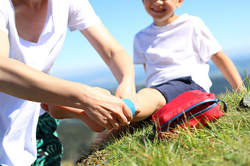 Image showing Bandaging legs. Elastic bandage, dressing