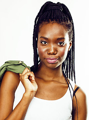 Image showing young pretty african-american girl posing cheerful emotional on white background isolated, lifestyle people concept 