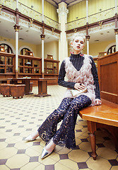 Image showing young attractive fashion lady on railway station waiting, vintag