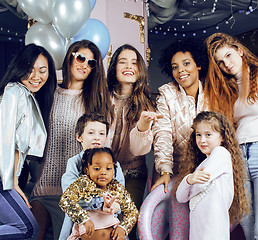 Image showing Lifestyle and people concept: young pretty diversity nations woman with different age children celebrating on birth day party together happy smiling, making selfie. African-american, asian and caucasi