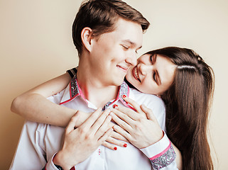 Image showing young pretty teenage couple, hipster guy with his girlfriend hap