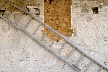 Image showing Rung ladder on a stony barn window near Perino, Valtrebbia, Italy