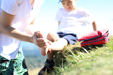 Image showing Broken leg, an accident on a mountain trail.