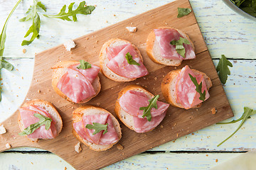 Image showing Baguette with ham on board