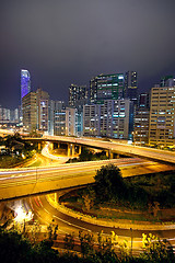 Image showing urban area dusk, busy traffic 