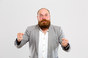 Image showing Evil man with ginger beard