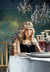 Image showing young blond woman wearing crown in fairy luxury interior with em