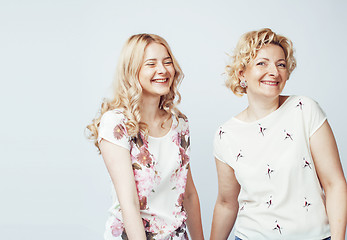 Image showing mother with daughter together posing happy smiling isolated on white background with copyspace, lifestyle people concept 