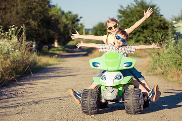 Image showing Happy little boy playing on road at the day time.