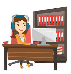 Image showing Business woman with headset working at office.