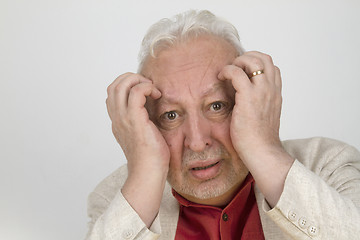 Image showing Senior man with strong headache