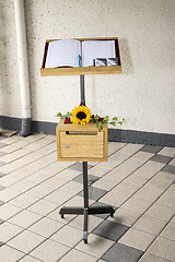 Image showing Condolences Book with Sun Flower and Ivy 