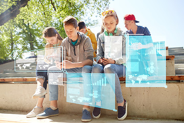 Image showing group of teenage friends with smartphones outdoors