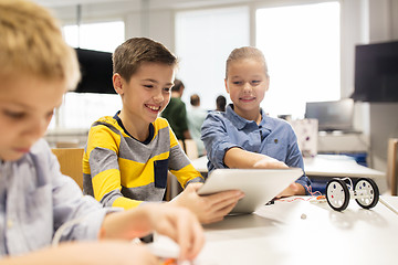 Image showing kids with tablet pc programming at robotics school