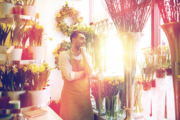 Image showing florist man or seller at flower shop