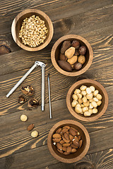 Image showing Mixed Nuts Pine Almonds Macadamia Walnuts Nutcracker