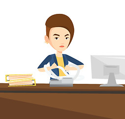Image showing Angry business woman tearing bills or invoices.