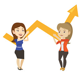 Image showing Two business women holding growth graph.