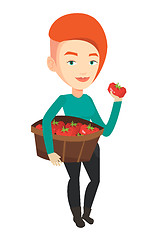 Image showing Farmer collecting tomatoes vector illustration.