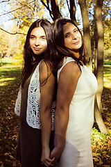 Image showing mature real mother with daughter outside autumn fall in park