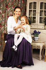 Image showing young mother with daughter at luxury home interior vintage