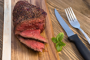 Image showing Beef Top Sirloin Steak Roast Sliced Coooked Medium Rare