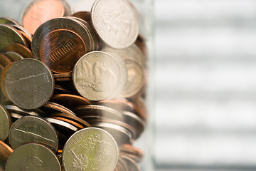 Image showing American Dollar Currency Coins in Jar Pennies Nickels Quarters D