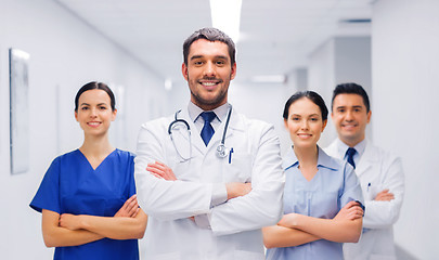 Image showing happy group of medics or doctors at hospital