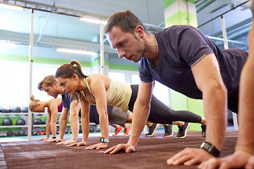 Image showing group of people exercising in gym