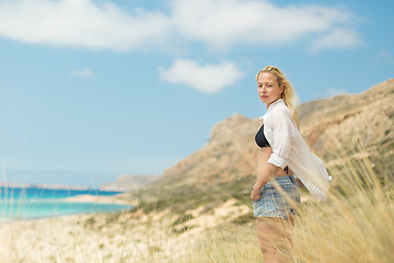 Image showing Free Happy Woman Enjoying Sun on Vacations.