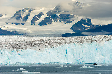 Image showing Boat Dwarfed by Mountains Glaciers Alaska Kenia Fjords 