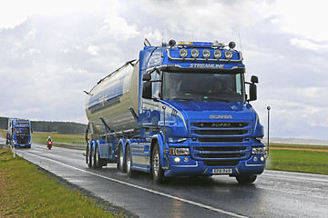 Image showing Conventional Scania T580 Forsgards on Rainy Highway