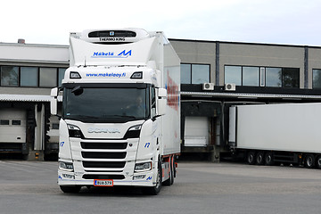 Image showing Scania R580 Truck Refrigerated Trailer on Warehouse Yard 