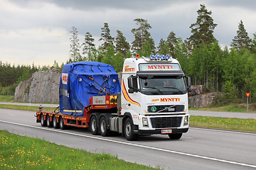 Image showing Volvo Truck Transports Industrial Object along Motorway