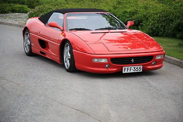 Image showing Red Ferrari Convertible Parked