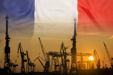 Image showing Industrial concept with France flag at sunset