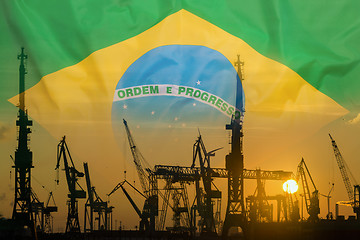 Image showing Industrial concept with Brazil flag at sunset