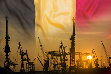 Image showing Industrial concept with Belgium flag at sunset