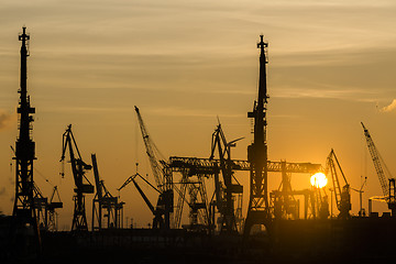 Image showing Silhouette of container harbor in Hamburg at sunset