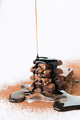 Image showing Chocolate slices with cocoa powder