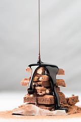 Image showing Tower of chocolates watered syrup