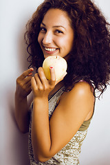 Image showing pretty young real tenage girl eating apple close up smiling