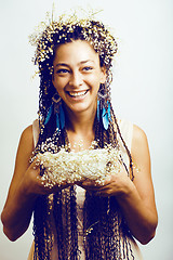 Image showing young pretty brunette girl with bouquet of little white spring f