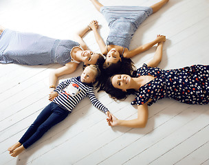 Image showing Mature sisters twins at home with little daughter, happy family 