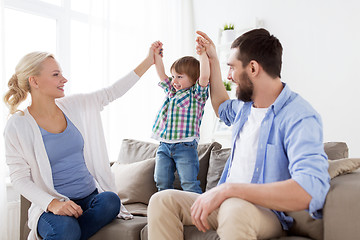 Image showing happy family having fun at home