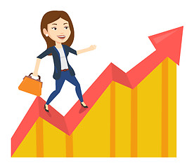 Image showing Business woman standing on profit chart.