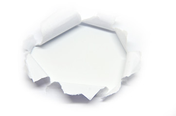 Image showing Hole in the paper with torn side