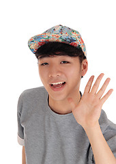 Image showing Happy Asian man with cap.