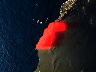 Image showing Western Sahara in red from space at night